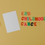 在中山南路上,跑過孩子們的明天 A yellow ribbon and text advocating for ending childhood cancer.